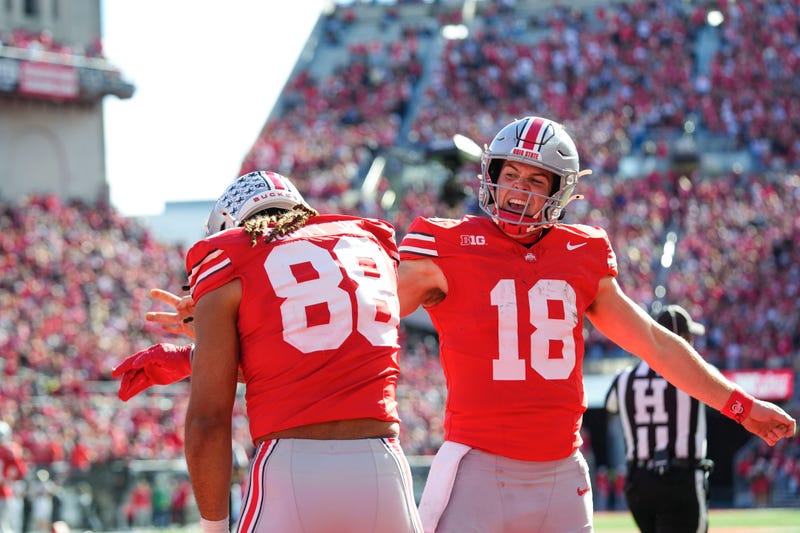 Ohio State Buckeyes quarterback Will Howard (18) celebrates with tight end Gee Scott Jr. (88) after Scott scored a touchdown in the first half at Ohio Stadium on Saturday, Nov. 9, 2024 in Columbus, Ohio.