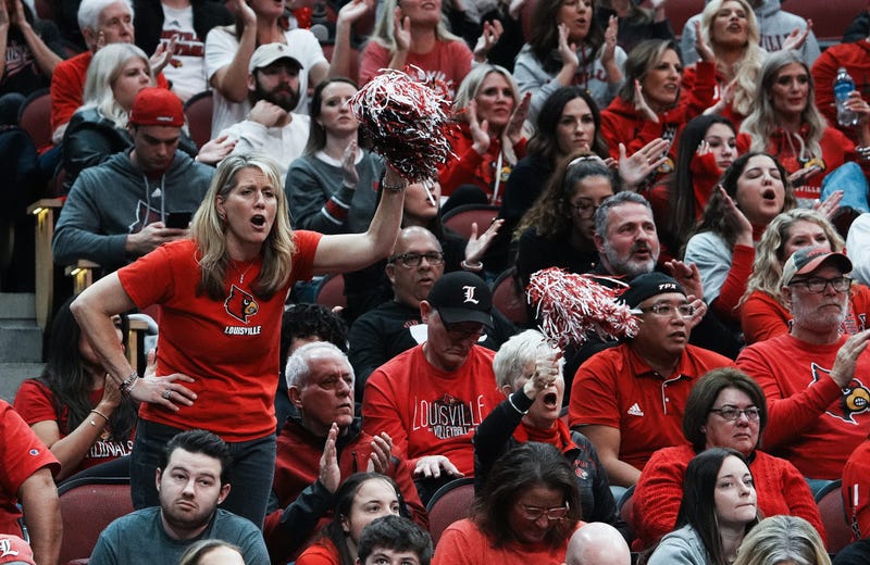 Louisville volleyball fans clapping