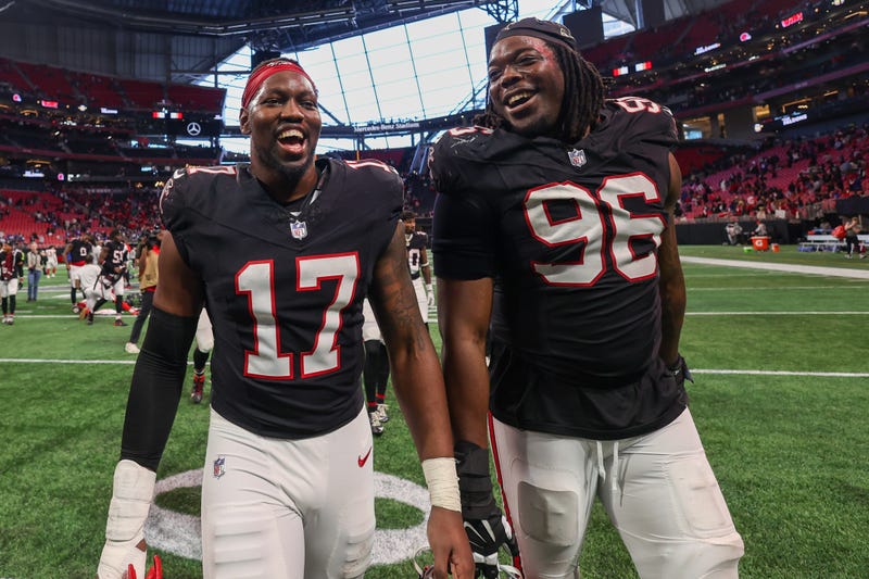 Dec 22, 2024; Atlanta, Georgia, USA; Atlanta Falcons linebacker Arnold Ebiketie (17) and defensive end Zach Harrison (96) celebrate after a victory over the New York Giants at Mercedes-Benz Stadium. Mandatory Credit: Brett Davis-Imagn Images