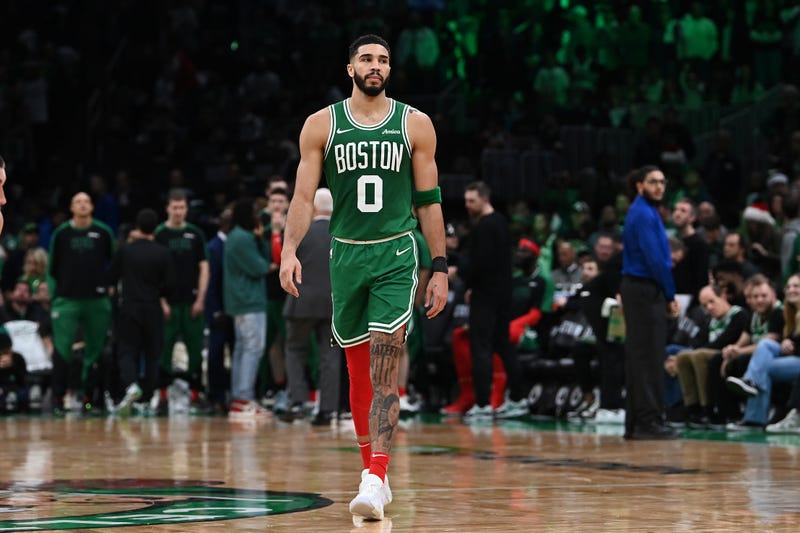 Boston Celtics forward Jayson Tatum (0) walks on the court during a timeout during the second half against the Philadelphia 76ers at TD Garden.