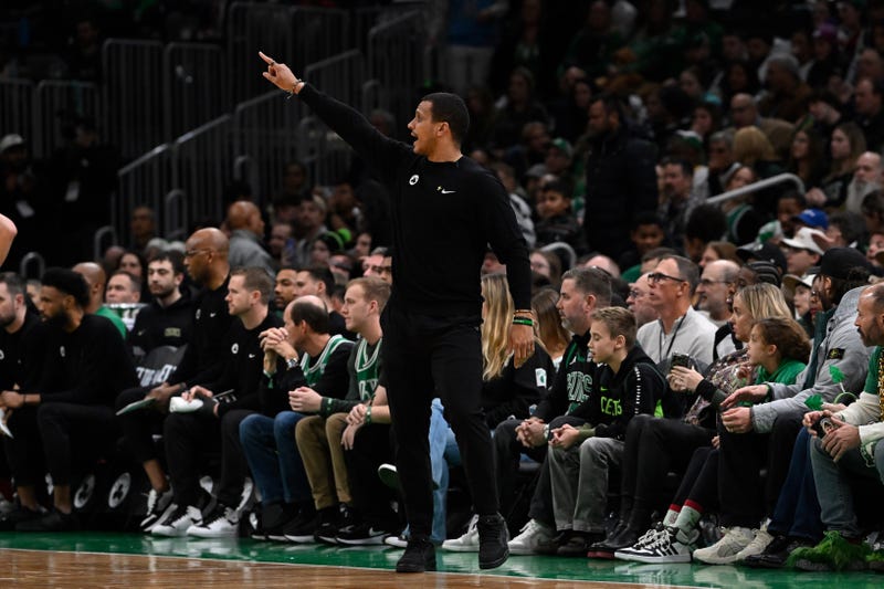 Boston Celtics head coach Joe Mazzulla signals from the sideline during the first half against the Philadelphia 76ers at TD Garden.