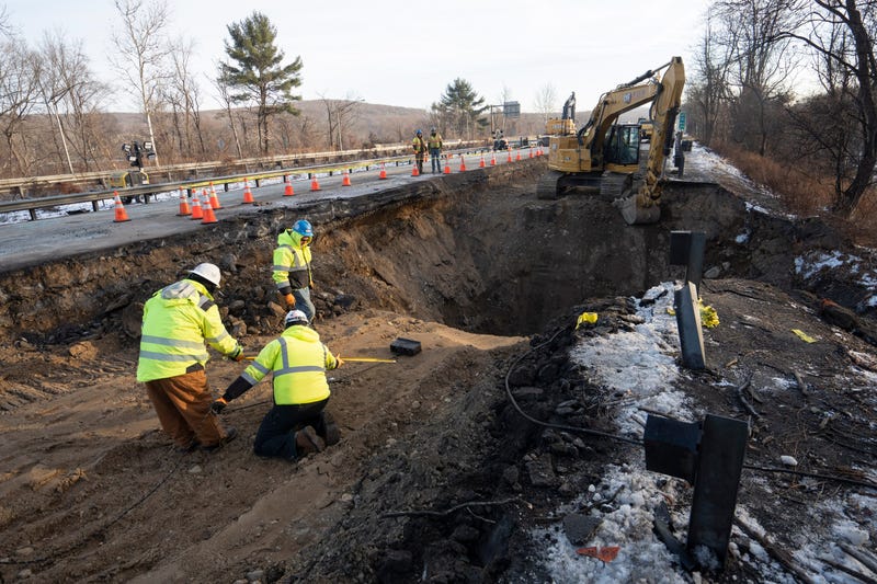 Construction workers continue repairs using heavy machinery on I-80 East in Wharton on Friday, Dec. 27, 2024