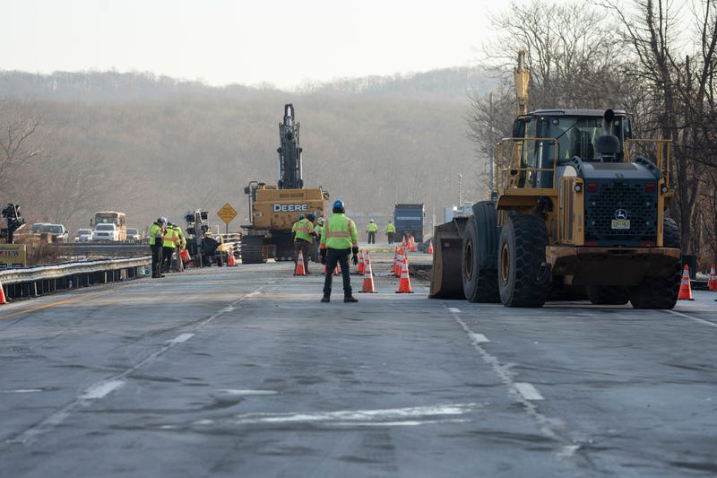 Construction workers continue repairs using heavy machinery on I-80 East in Wharton on Friday, Dec. 27, 2024
