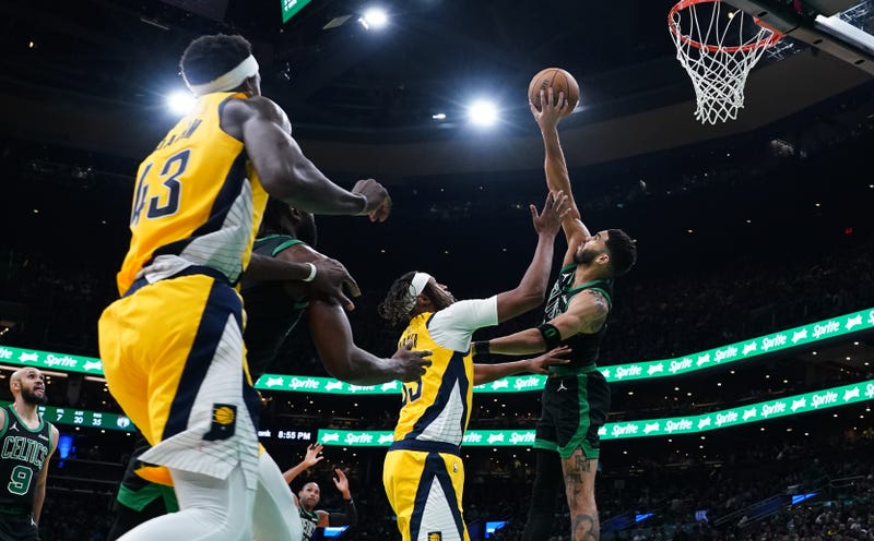 Boston Celtics forward Jayson Tatum (0) defends against Indiana Pacers center Myles Turner (33) in the second half at TD Garden