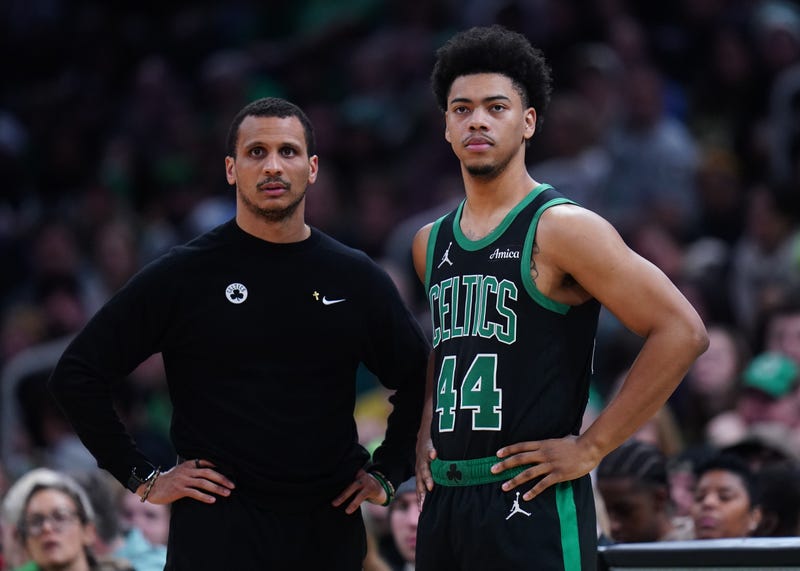 Boston Celtics head coach Joe Mazzulla talks with guard Jaden Springer (44) from the sideline as they take on the Indiana Pacers at TD Garden.