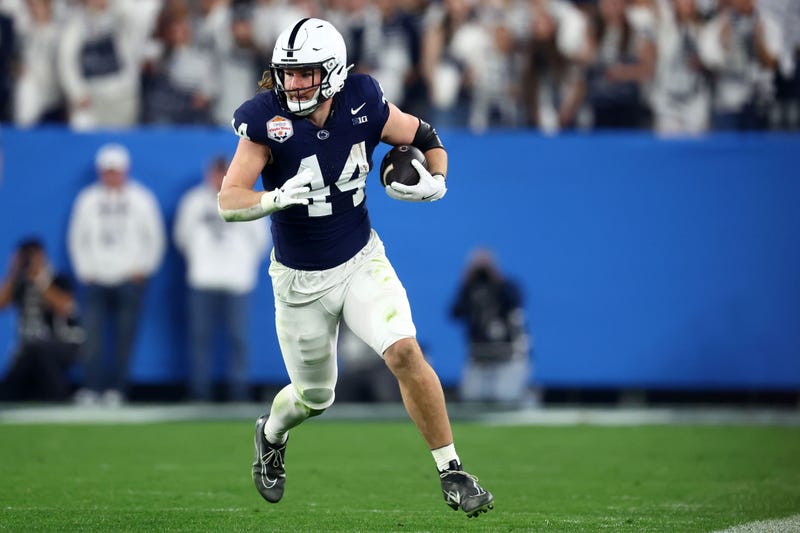 Penn State Nittany Lions tight end Tyler Warren (44) runs after a catch against the Boise State Broncos during the first half in the Fiesta Bowl at State Farm Stadium.