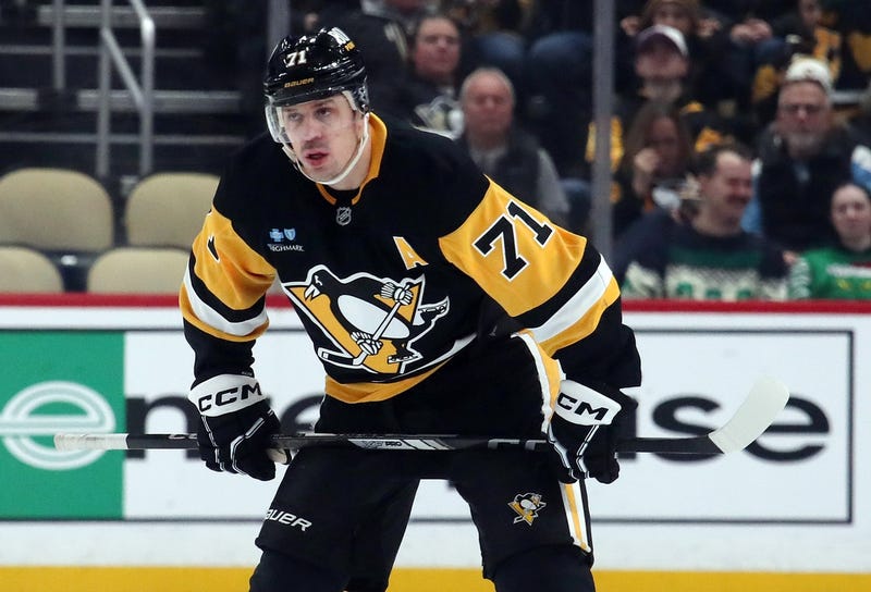 Evgeni Malkin looking on ice