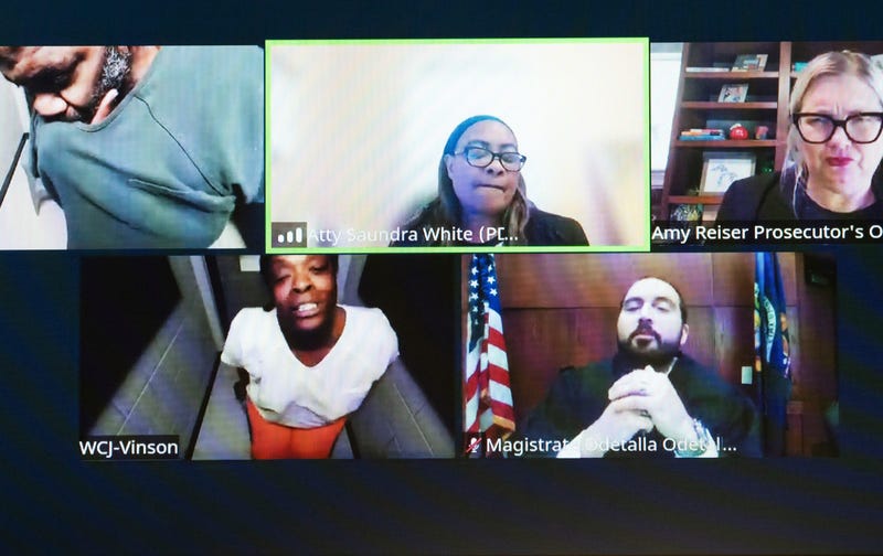 Screenshot of Zoom arraignment of suspects in Northfield Township murders, child abduction