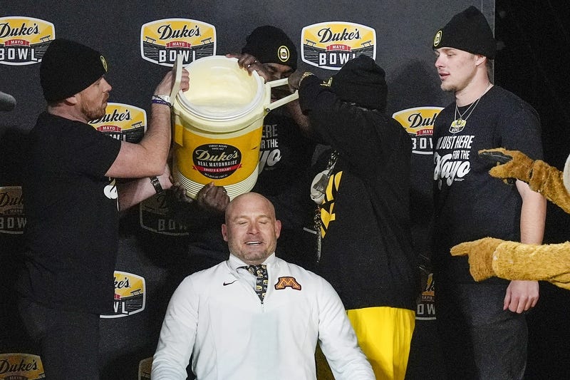 Minnesota Golden Gophers head coach P.J. Fleck prepares for the mayo dump after his teams’ win over Virginia Tech Hokies at the Duke’s Mayo Bowl at Bank of America Stadium.