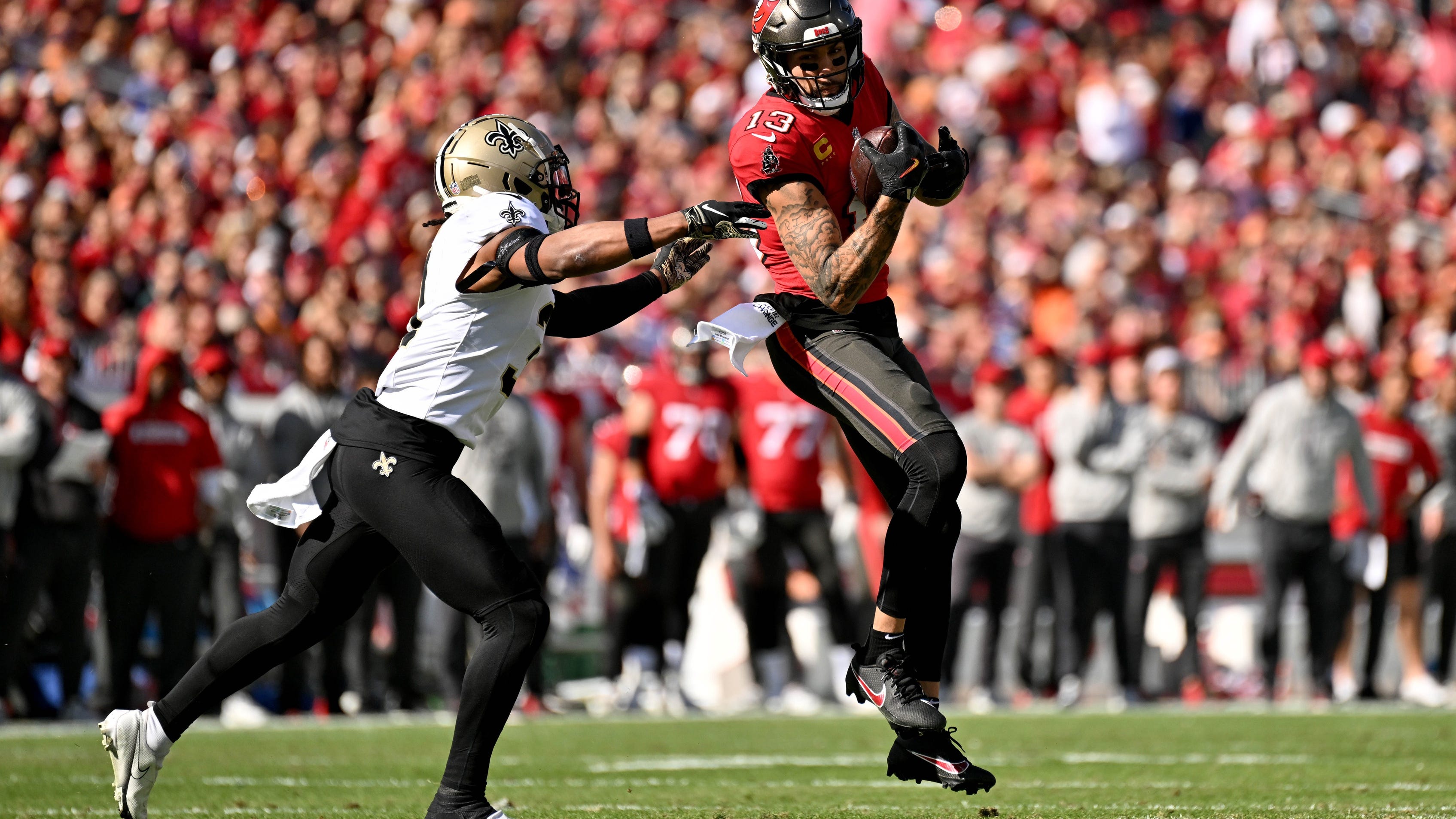 Saints battle but fall short as Bucs clinch NFC South, Mike Evans ekes out record