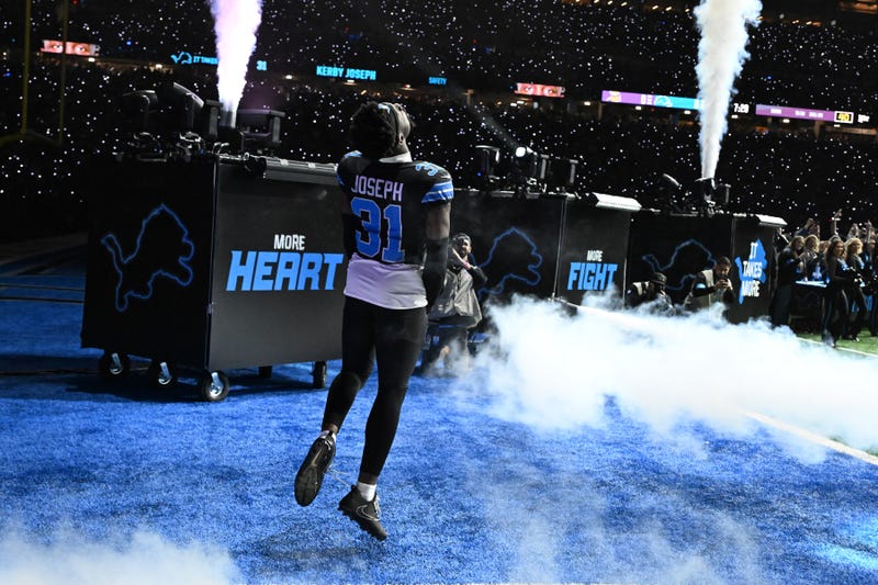Kerby Joseph runs onto the field during pregame introductions