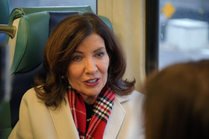 Gov. Kathy Hochul, a proponent of congestion pricing, rides a Metro-North Railroad train this month