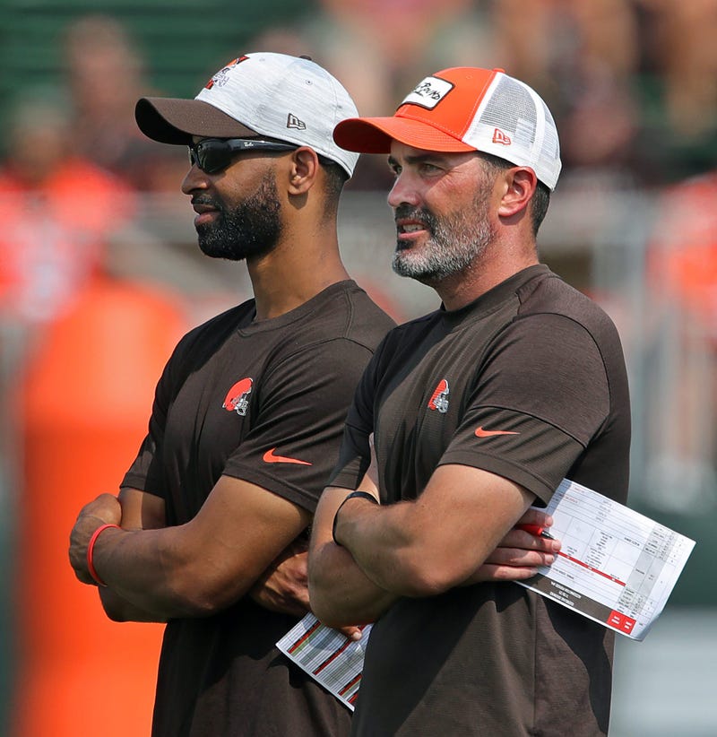 Browns GM Andrew Berry, left, and coach Kevin Stefanski watch practice in training camp, Saturday, July 31, 2021, in Berea.
