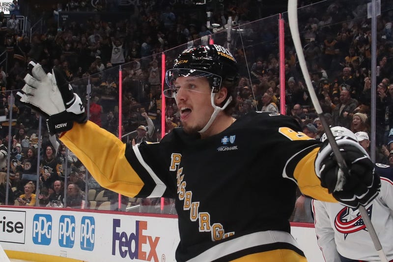 Rickard Rakell celebrates scoring