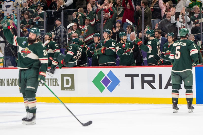 The Minnesota Wild bench celebrate after an empty net goal scored by Minnesota Wild center Marcus Johansson (90) seals the victory against the St. Louis Blues in the third period at Xcel Energy Center. 