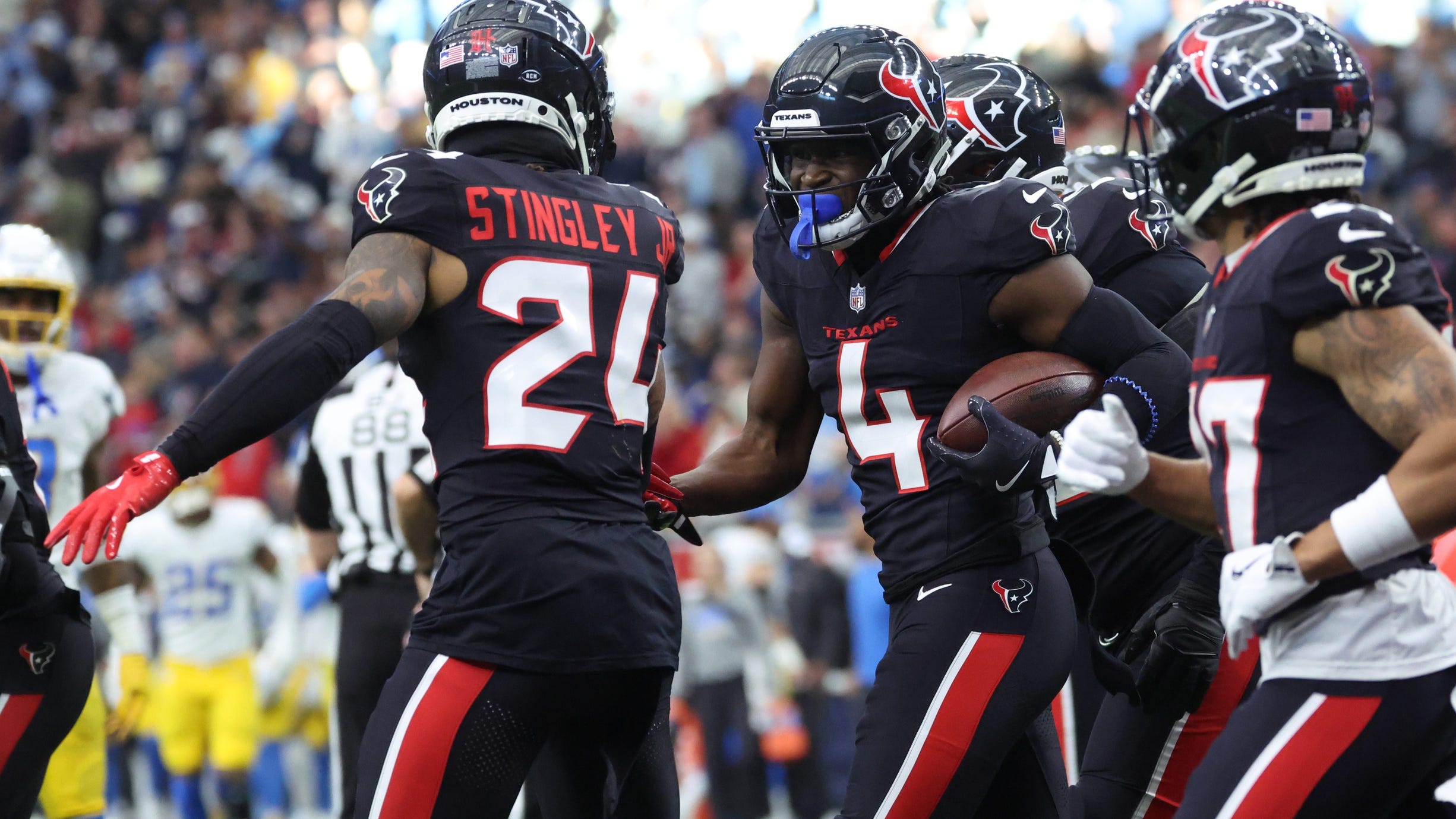 Texans advance with convincing wild-card win over Chargers