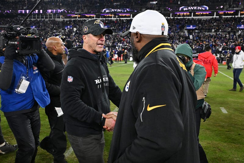 Mike Tomlin shaking John Harbaugh's hand