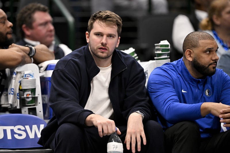 Jan 12, 2025; Dallas, Texas, USA; Dallas Mavericks guard Luka Doncic (77) reacts from the team bench during the second half of the game against the Denver Nuggets at the American Airlines Center. 