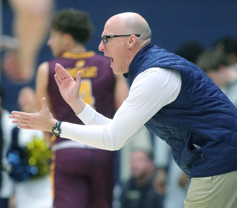 University of Akron coach John Groce encourages the Zips during a game against Central Michigan on Tuesday, Jan. 7, 2025, in Akron.