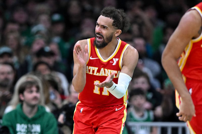 Atlanta Hawks guard Trae Young (11) reacts after scoring against the Boston Celtics during the fourth quarter at the TD Garden.