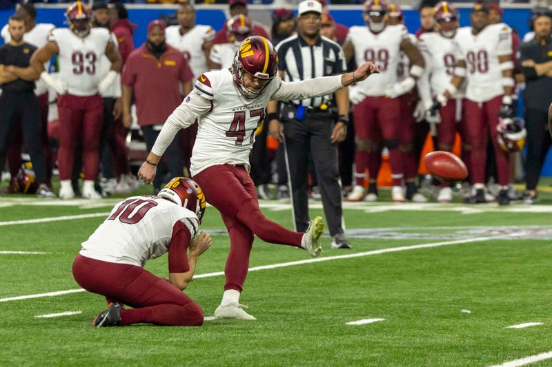 Washington Commanders Kicker Zane Gonzalez (47) makes a field goal against the Detroit Lions during the second quarter at Ford Field.
