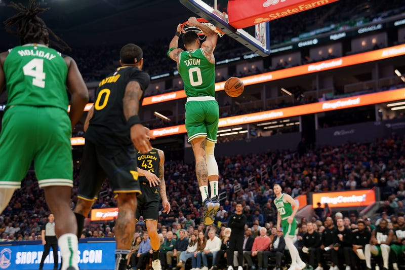 Boston Celtics forward Jayson Tatum (0) dunks the ball against the Golden State Warriors in the second quarter at the Chase Center.
