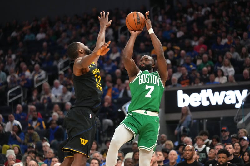 Boston Celtics forward Jaylen Brown (7) shoots over Golden State Warriors forward Andrew Wiggins (22) in the second quarter at the Chase Center.