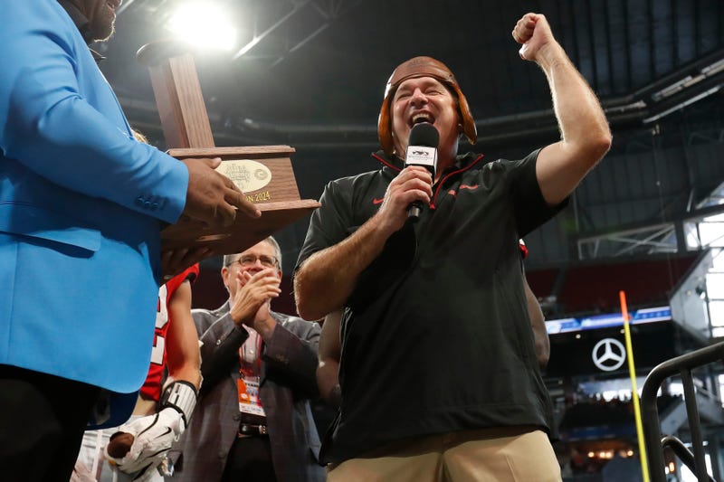 Georgia coach Kirby Smart celebrates after winning the NCAA Aflac Kickoff Game in Atlanta, on Saturday, Aug. 31, 2024.