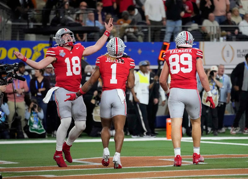 Ohio State Buckeyes running back Quinshon Judkins (1) and quarterback Will Howard (18) celebrates his touchdown run against Texas Longhorns in the fourth quarter of the Cotton Bowl Classic during the College Football Playoff semifinal game at AT&T Stadium in Arlington, Texas on January, 10, 2025.