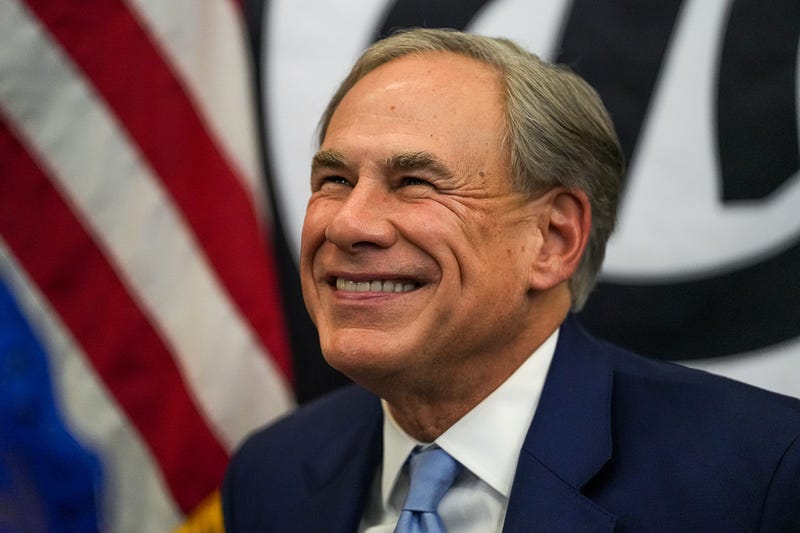 Texas Governor Greg Abbott takes photos with spectators after the State of the State address at Arnold Oil Company on Sunday, February. 2, 2025.