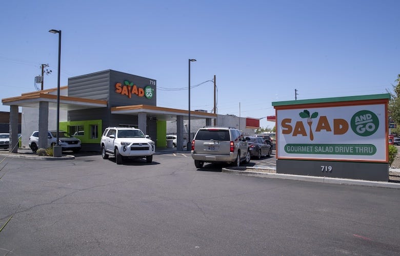 Cars drive through Salad and Go at lunchtime