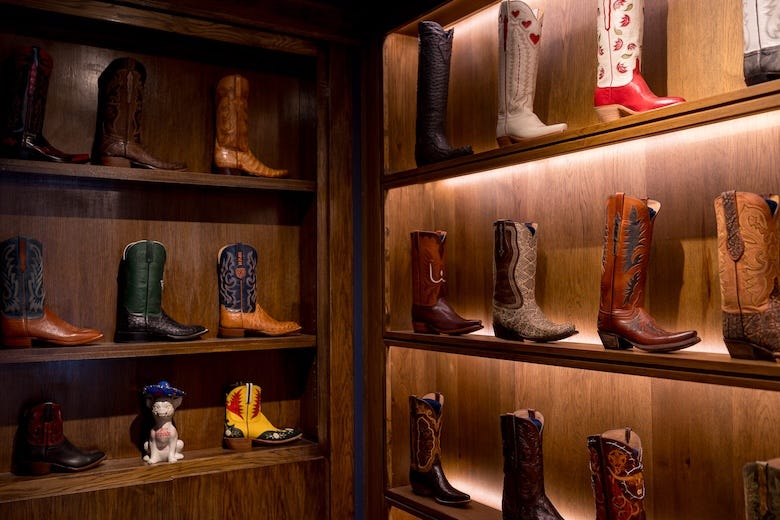 Lucchese boots on a shelf