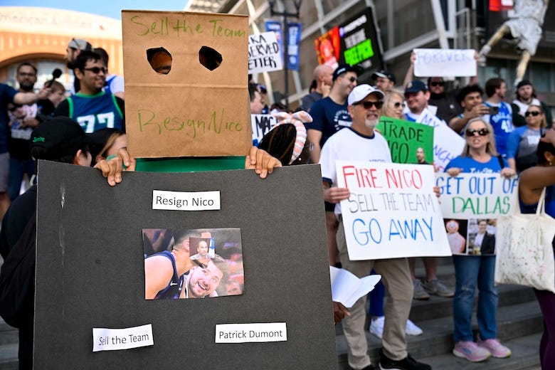 Dallas Mavericks fans gather outside the arena before the game between the Dallas and the Houston Rockets to protest the Nico Harrison trade of former Mavericks point guard Luka Doncic to the Los Angeles Lakers