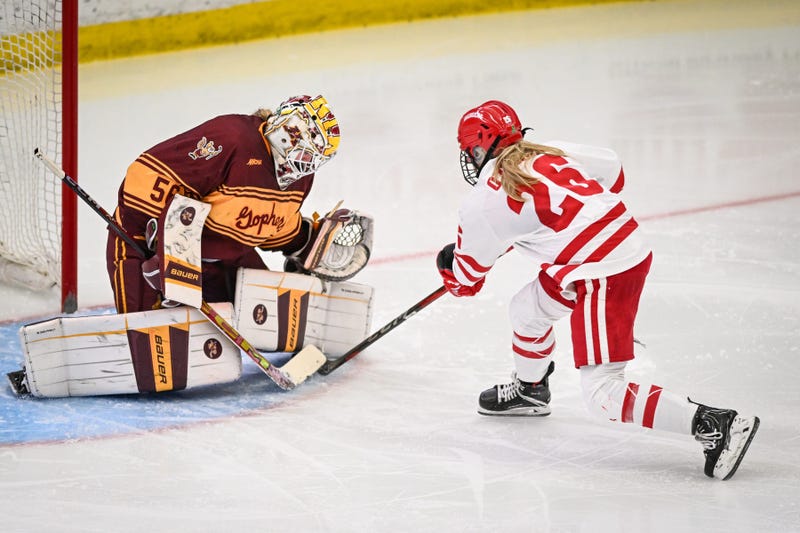 Minnesota Gophers goaltender Hannah Clark (56) stops Wisconsin Badgers center Casey O'Brien (26) on a penalty shot in the second period of a game Sunday, February 9, 2025, at LaBahn Arena in Madison, Wisconsin.