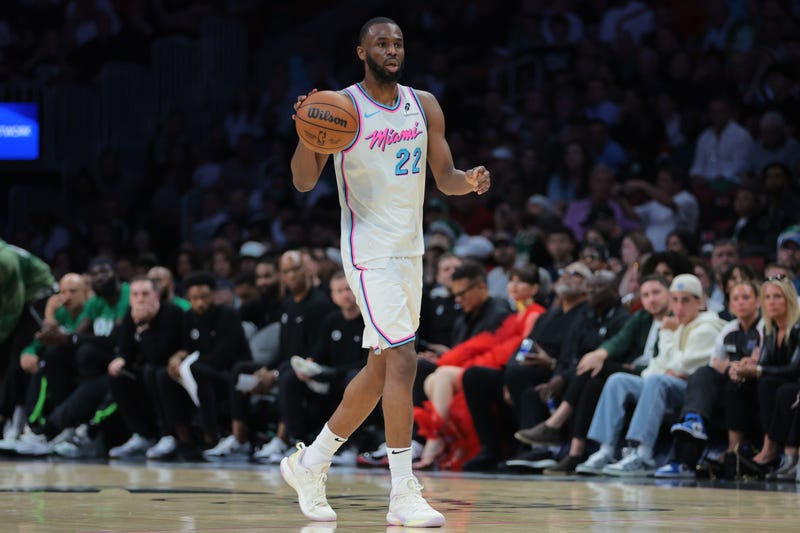 Miami Heat forward Andrew Wiggins dribbles against the Celtics at Kaseya Center