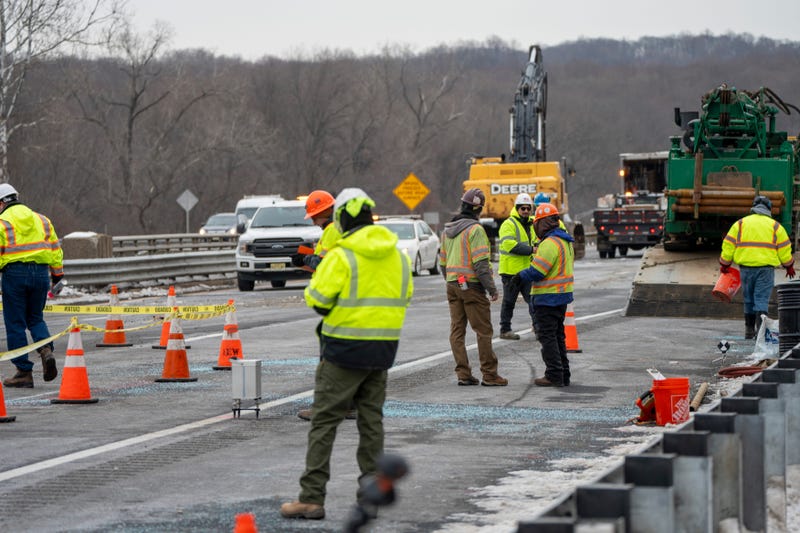 New Jersey Department of Transportation and construction workers repair a sinkhole that closed Interstate 80 eastbound near Exit 34 in Wharton on Feb. 11, 2025