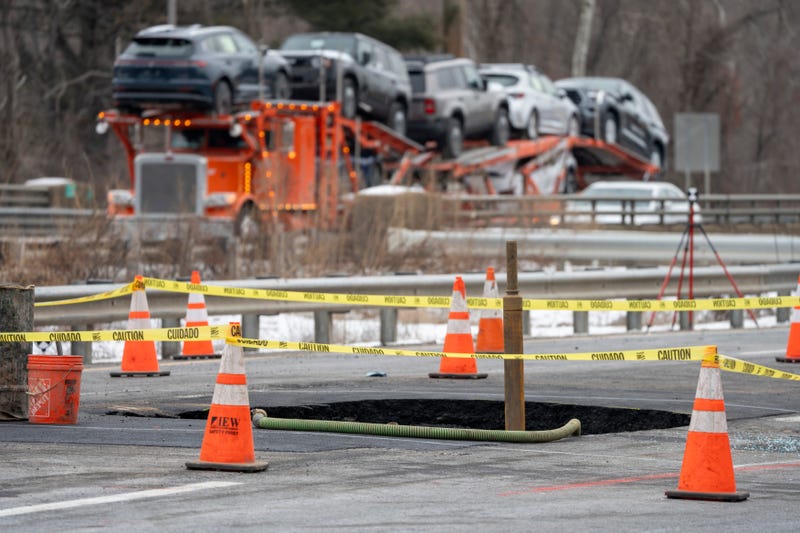 New Jersey Department of Transportation and construction workers repair a sinkhole that closed Interstate 80 eastbound near Exit 34 in Wharton on Feb. 11, 2025
