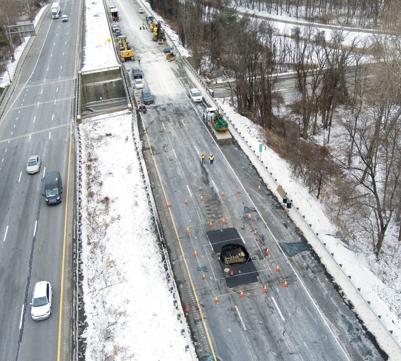A sinkhole is shown in the center lane of Interstate 80 eastbound approaching Route 15 in Wharton on February 11, 2025