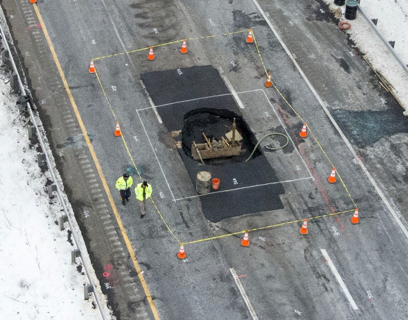 A sinkhole is shown in the center lane of Interstate 80 eastbound approaching Route 15 in Wharton on Feb. 11, 2025