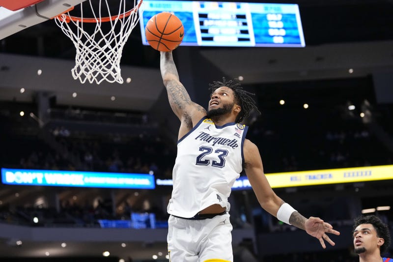 Feb 11, 2025; Milwaukee, Wisconsin, USA; Marquette Golden Eagles forward David Joplin (23) tries for a slam dunk during the second half against the DePaul Blue Demons at Fiserv Forum. Mandatory Credit: Jeff Hanisch-Imagn Images