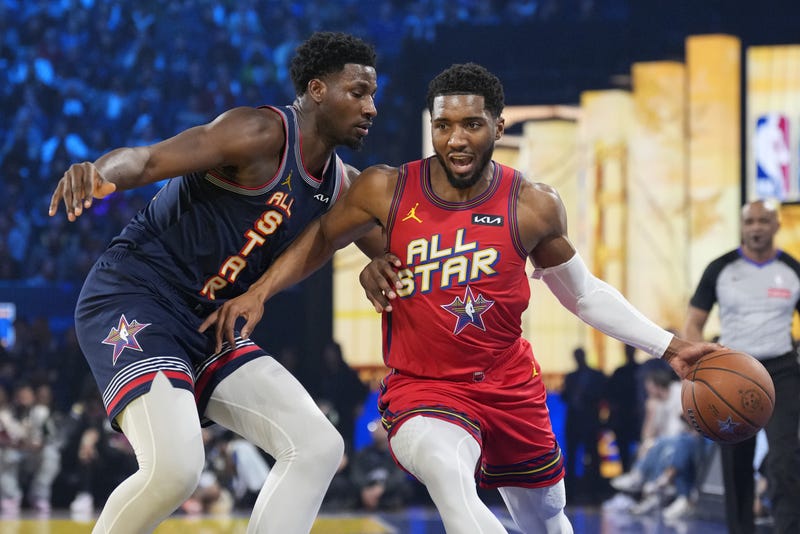 Feb 16, 2025; San Francisco, CA, USA; Chuck’s Global Stars guard Donovan Mitchell (5) of the Cleveland Cavaliers controls the ball against Kenny’s Young Stars forward Jaren Jackson Jr. (13) of the Memphis Grizzlies during the 2025 NBA All Star Game at Chase Center.