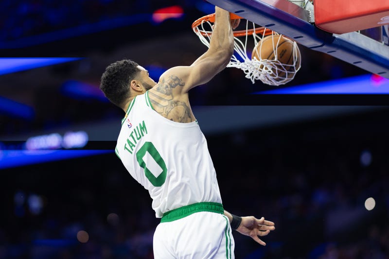 Boston Celtics forward Jayson Tatum (0) dunks the ball against the Philadelphia 76ers during the second quarter at Wells Fargo Center.