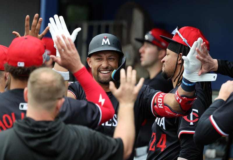 Minnesota Twins third base Royce Lewis (23) celebrates with teammates after hitting a home run against the Tampa Bay Rays during the second inning at Charlotte Sports Park during spring training before a hamstring injury put him on the Injured List.