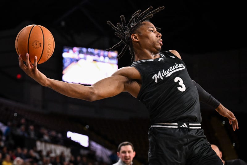 UW-Milwaukee Panthers forward Jamichael Stillwell (3) saves the ball from going out of bounds against the Oakland Golden Grizzlies during the first half in a game Thursday, February 27, 2025, at the UWM Panther Arena in Milwaukee, Wisconsin.