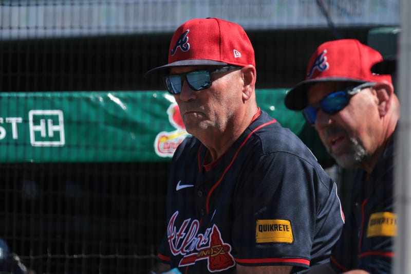 Feb 28, 2025; Jupiter, Florida, USA; Atlanta Braves manager Brian Snitker (43) watches the game against the Miami Marlins during the fifth inning at Roger Dean Chevrolet Stadium. Mandatory Credit: Sam Navarro-Imagn Images