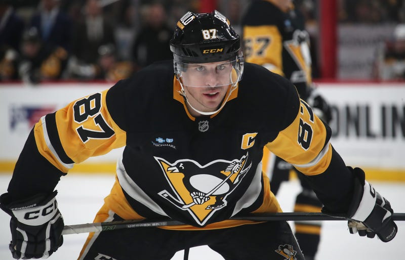 Sidney Crosby hunched over on ice