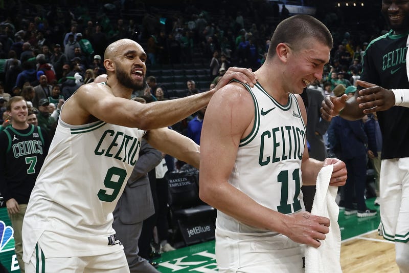 For the first time in Boston Celtics history, two teammates scored over 40 points in a game, Boston Celtics guard Derrick White (9), 41 points, and guard Payton Pritchard (11) ,43 points as they joke around after their win over the Portland Trail Blazers at TD Garden