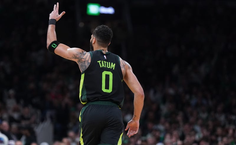 Boston Celtics forward Jayson Tatum (0) reacts after his three point basket against the Philadelphia 76ers in the second half at TD Garden.