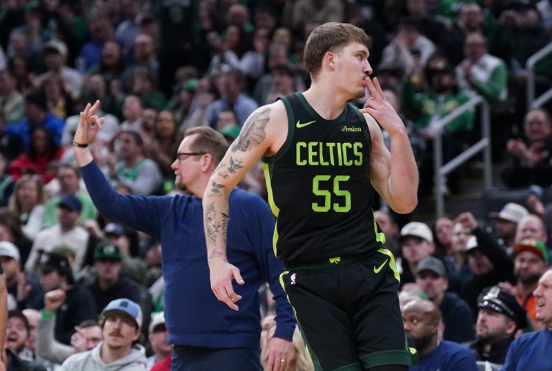 Boston Celtics forward Baylor Scheierman (55) reacts after his three point basket along with Philadelphia 76ers head coach Nick Nurse in the second half at TD Garden.