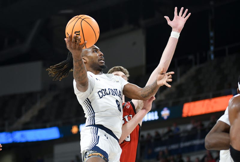 Robert Morris layup by Kam Woods